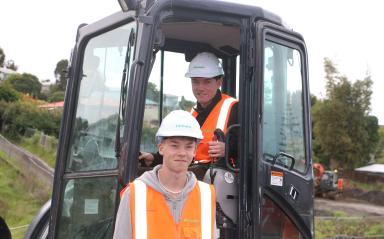 Close to home – twins learn construction basics in their own neighbourhood